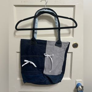 Introducing our eco-friendly upcycled denim bag.